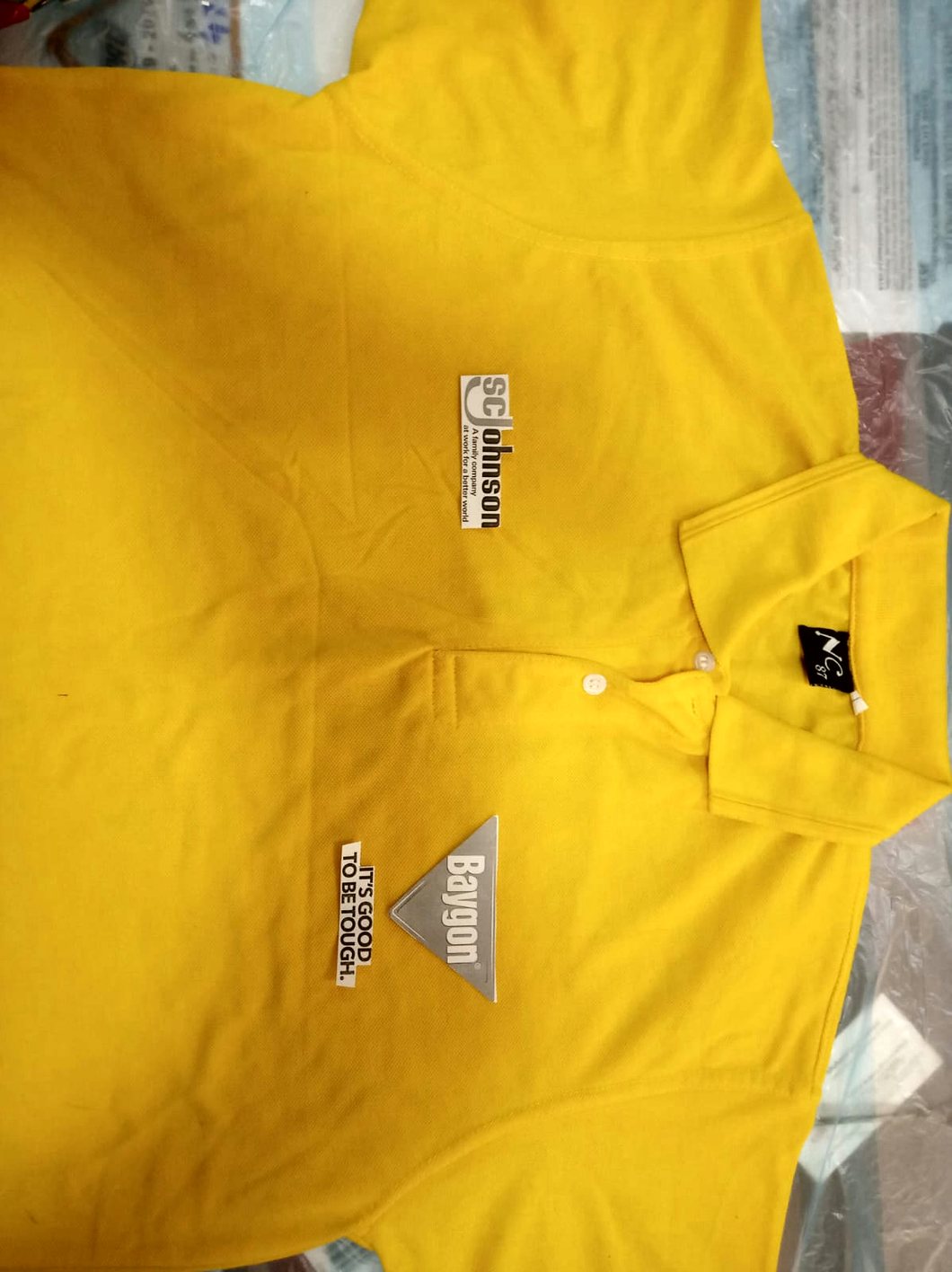 SC Johnson: Yellow polos, Baygon and SC Johnson prints, the polo