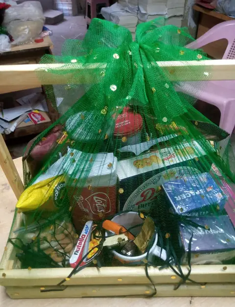 Engro: Gift hamper in a crate, green net wrap