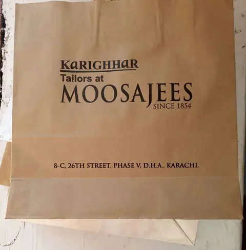 Moosajees: Kraft carrier bag, printed